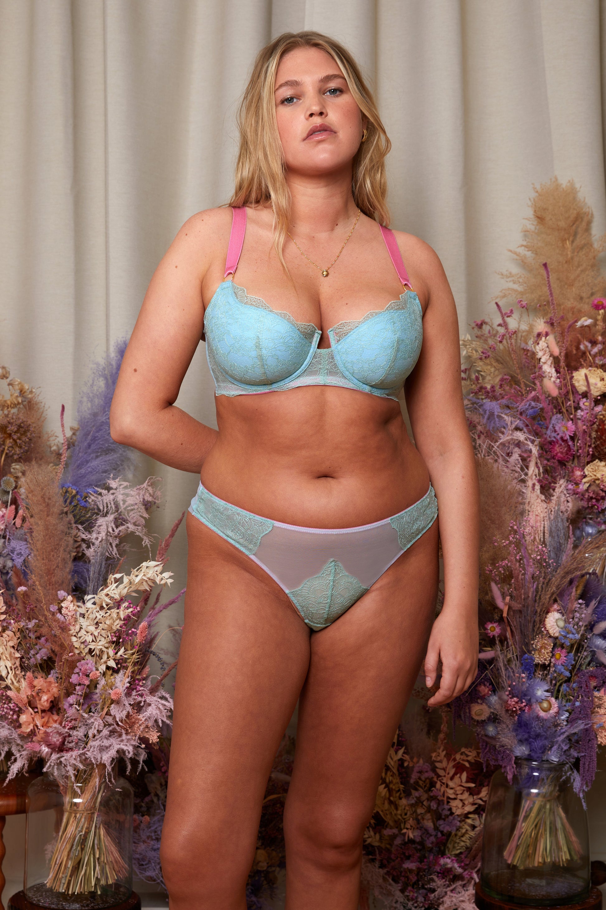 model:Ayeisha is wearing a 34DD